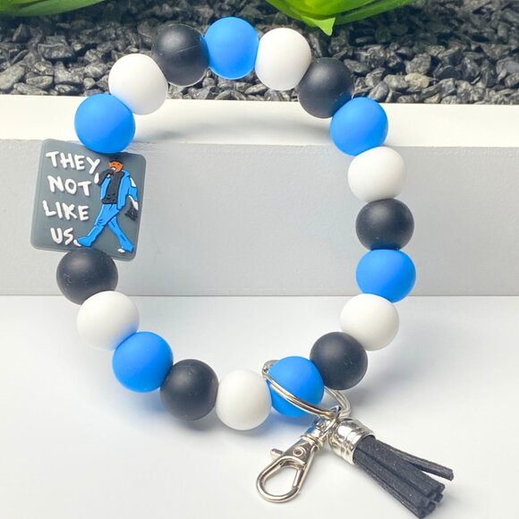 They Not Like Us" Beaded Wristlet - Picture 1 of 3